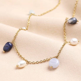 Semi Precious Blue Bead and Pearl Charm Necklace in Gold