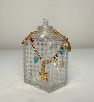 Starfish, Shell & Bead Charm Bracelet in Gold
