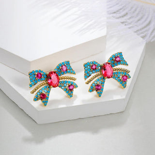 Embellished bow earring in turquoise, pink & gold